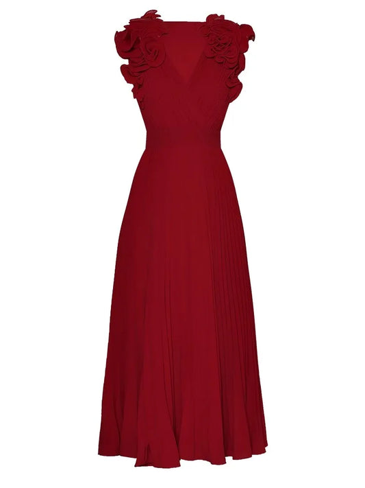 فستان داكوتا ذو رقبة على شكل حرف V بدون أكمام ومزين بزهرة ديسكويد للحفلات
