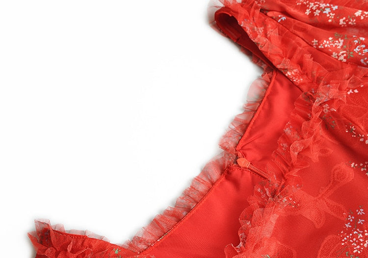فستان فلورين بأكمام فانوس وخصر عالي وطبعة زهور حمراء لقضاء العطلات